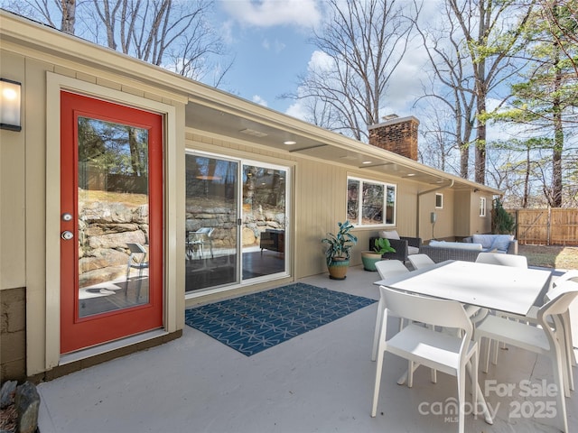 view of patio / terrace with fence