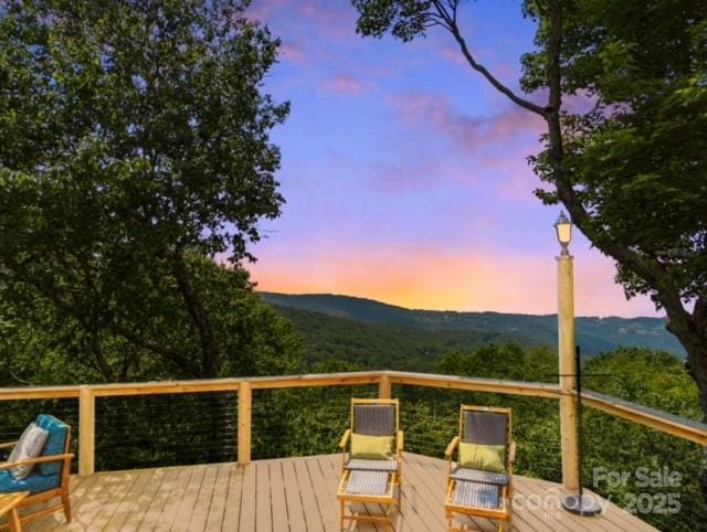 deck with a mountain view