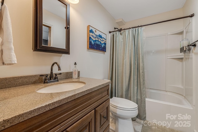 bathroom with vanity, toilet, and shower / bath combo with shower curtain