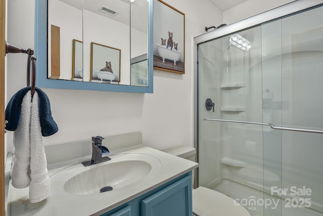 114 Spruce Hollow Rd, Beech Mountain, NC 28604 - full bathroom featuring a shower stall, vanity, and toilet