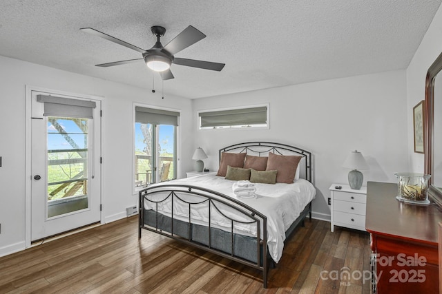 114 Spruce Hollow Rd, Beech Mountain, NC 28604 - bedroom with access to outside, wood finished floors, a textured ceiling, and a ceiling fan