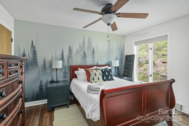 114 Spruce Hollow Rd, Beech Mountain, NC 28604 - bedroom featuring wood finished floors, a textured ceiling, baseboards, and ceiling fan