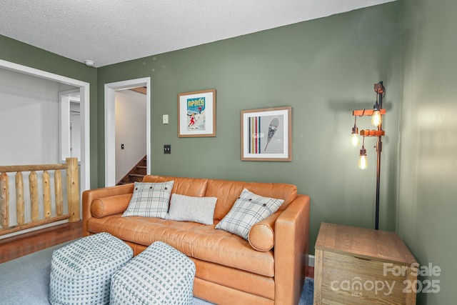 114 Spruce Hollow Rd, Beech Mountain, NC 28604 - living room featuring a textured ceiling and stairway