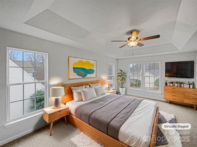 609 Sunset Point Dr, Rock Hill, SC 29732 - bedroom with multiple windows, a tray ceiling, and light colored carpet