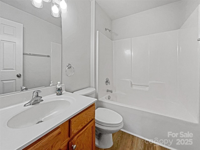 609 Sunset Point Dr, Rock Hill, SC 29732 - full bathroom featuring toilet, shower / washtub combination, vanity, and wood-type flooring