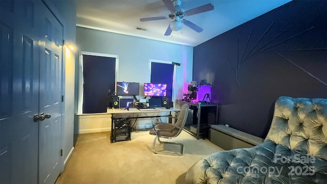 carpeted bedroom featuring ceiling fan