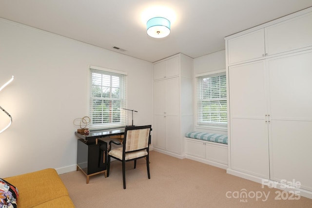 office area with light carpet and a wealth of natural light