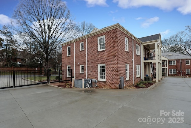 view of property exterior featuring central AC