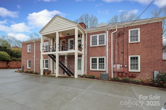 exterior space featuring central AC unit