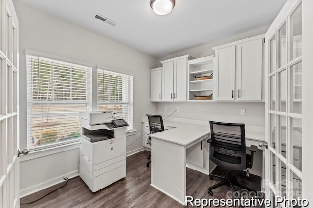 office space with dark hardwood / wood-style flooring