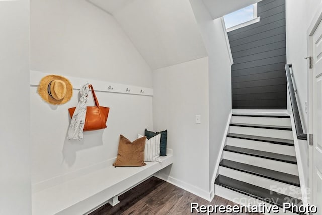 mudroom featuring dark hardwood / wood-style floors and vaulted ceiling