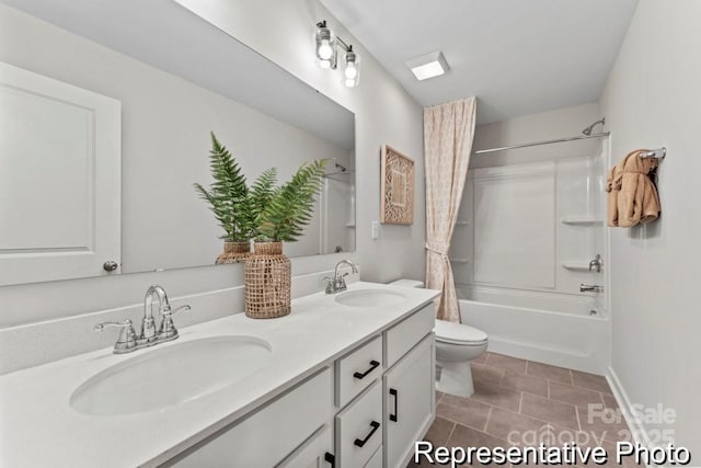 full bathroom with vanity, shower / bath combo, tile patterned floors, and toilet