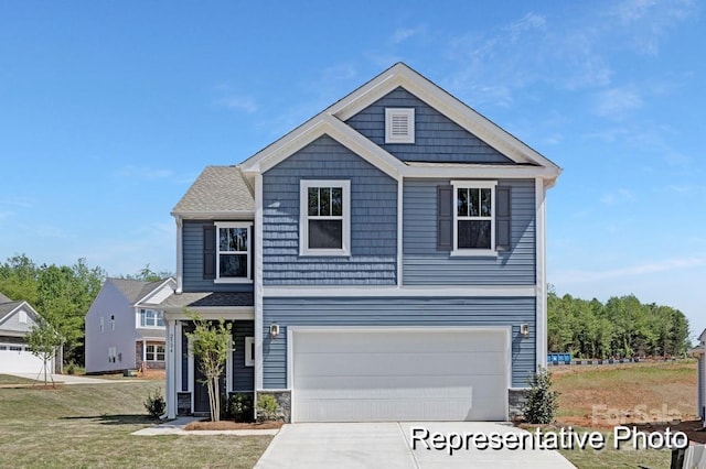 view of front of home with driveway, a front lawn, stone siding, and a garage