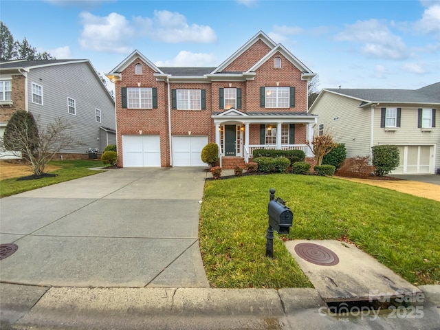 view of front of home with a porch, a garage, and a front yard