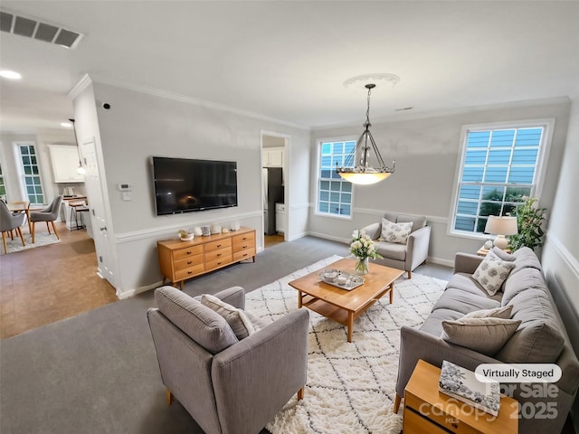 living room with crown molding