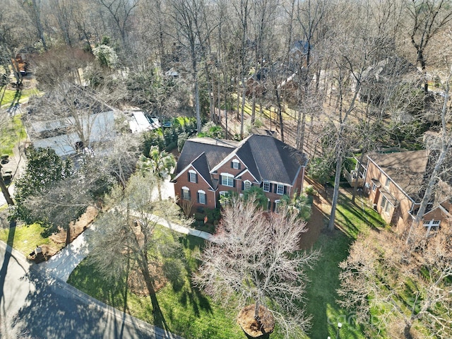 bird's eye view featuring a view of trees