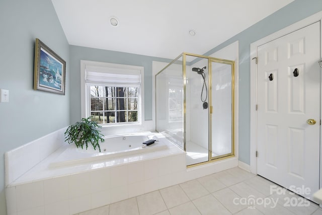 full bath with a shower stall, a tub with jets, and tile patterned flooring