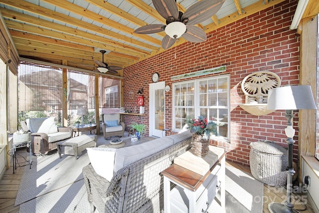 view of patio featuring an outdoor living space and a ceiling fan