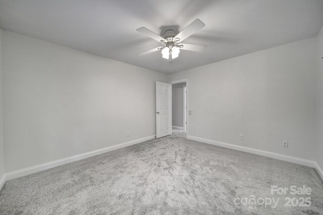 907 Thorn Ridge Ln, Lake Wylie, SC 29710 - spare room with baseboards, carpet, and a ceiling fan