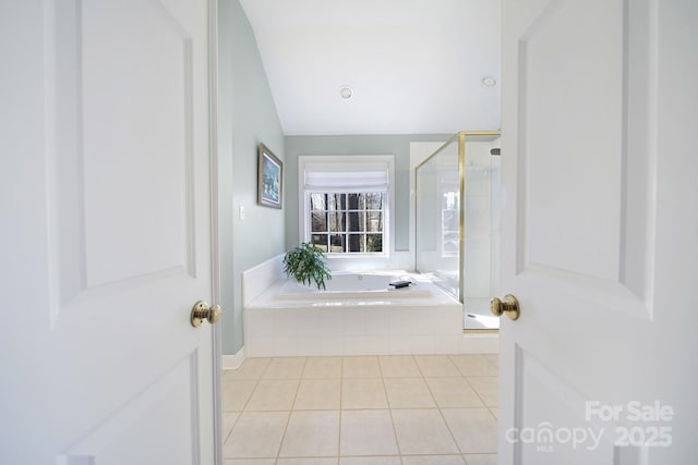 907 Thorn Ridge Ln, Lake Wylie, SC 29710 - full bath featuring a stall shower, a bath, tile patterned flooring, and lofted ceiling