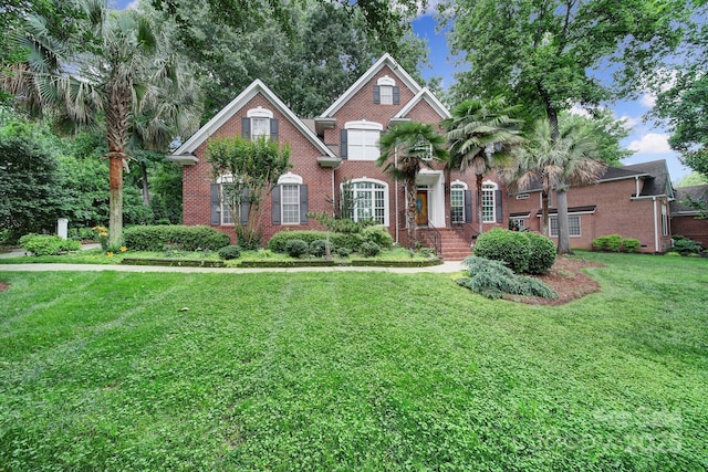 907 Thorn Ridge Ln, Lake Wylie, SC 29710 - view of front of home with brick siding and a front yard