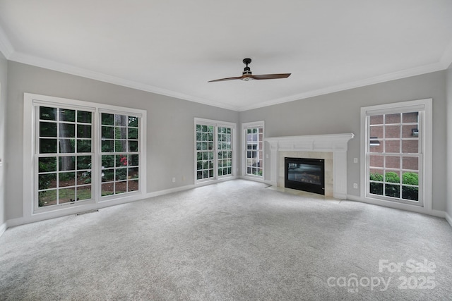 907 Thorn Ridge Ln, Lake Wylie, SC 29710 - unfurnished living room featuring baseboards, ceiling fan, carpet flooring, ornamental molding, and plenty of natural light
