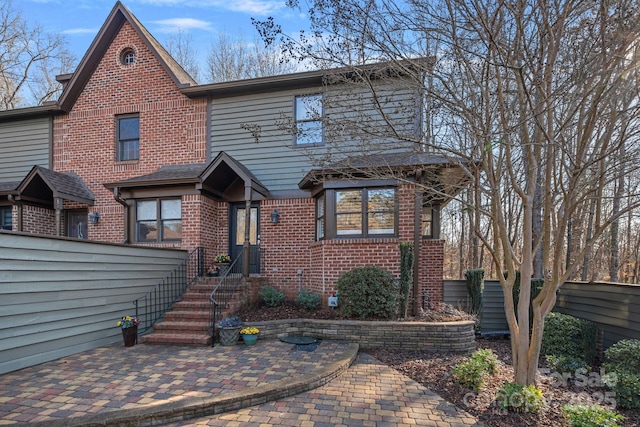 view of front of home featuring a patio