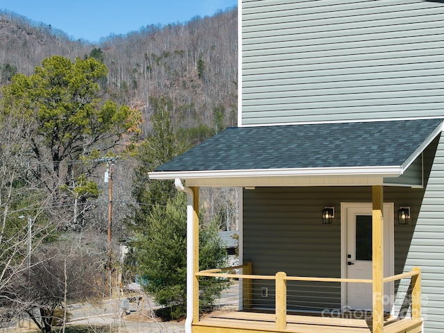 exterior space featuring a view of trees