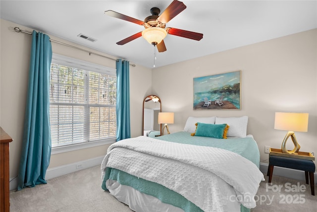 carpeted bedroom featuring ceiling fan