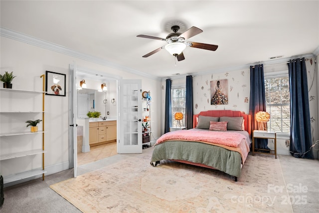 bedroom featuring french doors, ceiling fan, ornamental molding, and connected bathroom