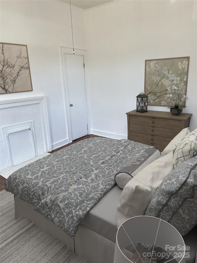 bedroom featuring baseboards