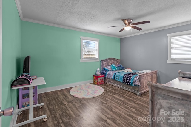 bedroom with dark hardwood / wood-style flooring, ceiling fan, crown molding, and a textured ceiling