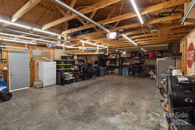 garage featuring a garage door opener