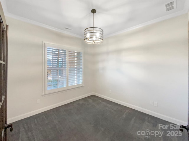 carpeted empty room with a chandelier and crown molding