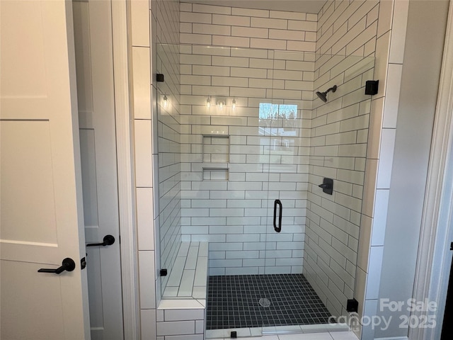 bathroom featuring an enclosed shower