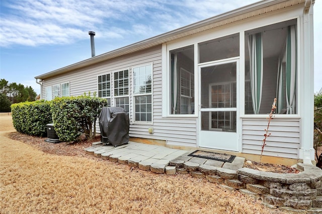 9119 Gander Dr, Charlotte, NC 28277 - rear view of house with a sunroom
