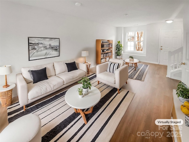 living room featuring light wood-type flooring