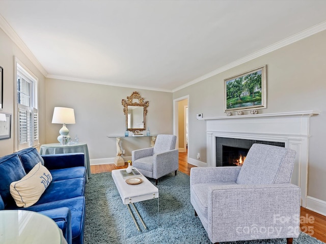 living room featuring hardwood / wood-style flooring and crown molding