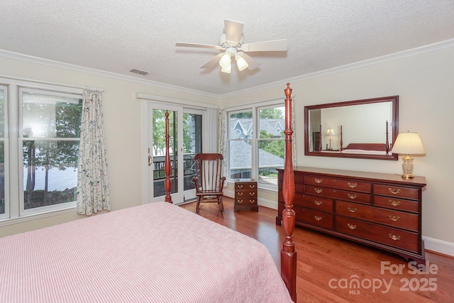 405 NW Dr, Davidson, NC 28036 - bedroom featuring ceiling fan, ornamental molding, light hardwood / wood-style floors, a textured ceiling, and access to outside
