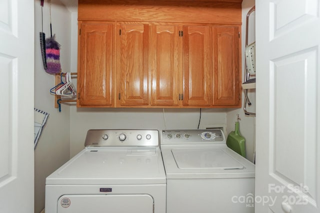 405 NW Dr, Davidson, NC 28036 - washroom with cabinets and washer and dryer