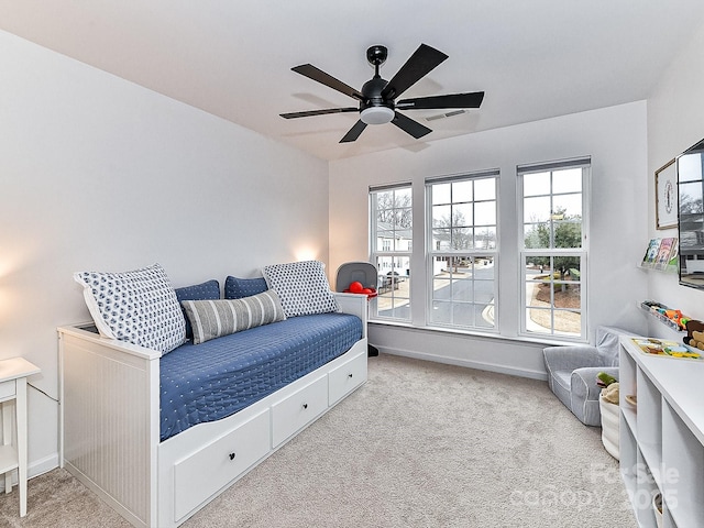 carpeted bedroom with ceiling fan