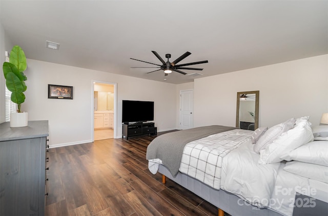 bedroom featuring ensuite bathroom, dark wood-style flooring, a ceiling fan, visible vents, and baseboards