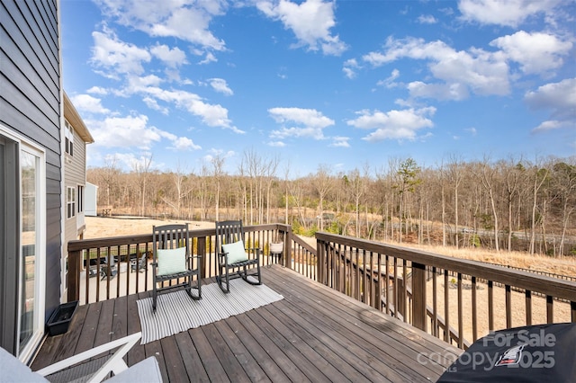 deck with a forest view