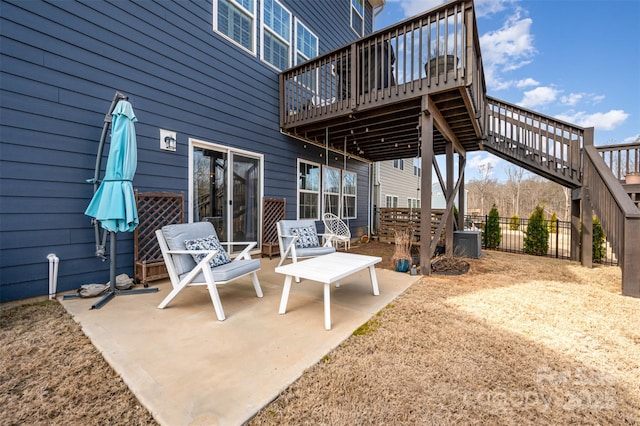 view of patio with stairs, fence, cooling unit, and a wooden deck