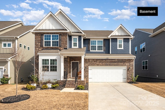 craftsman house featuring a garage, a shingled roof, concrete driveway, board and batten siding, and brick siding