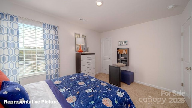 bedroom featuring light colored carpet