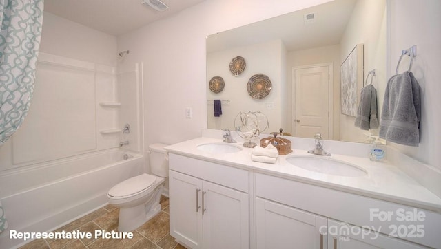 full bathroom with vanity, shower / bath combination with curtain, and toilet