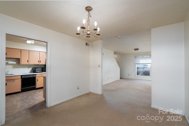 kitchen featuring light colored carpet, black appliances, visible vents, decorative light fixtures, and light countertops