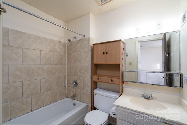 full bath with toilet, visible vents, vanity, and shower / washtub combination