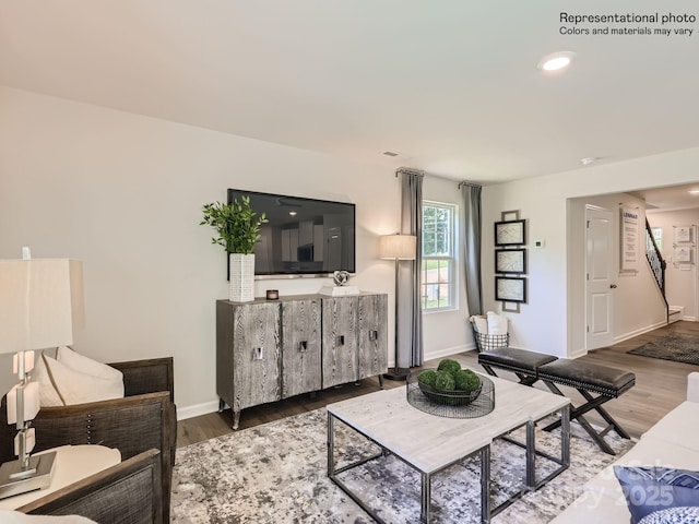 living room with dark hardwood / wood-style floors